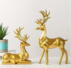 Two Piece Golden Resin Deer Decor Set